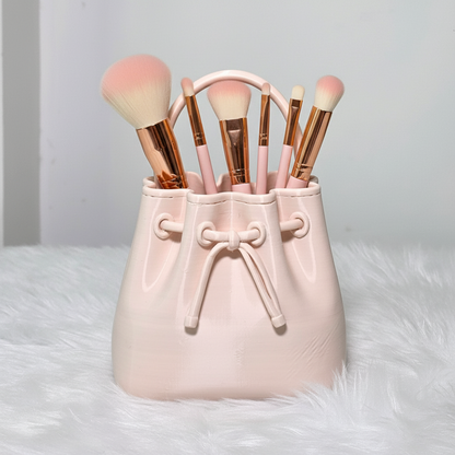 Bag shaped makeup holder with brushes 